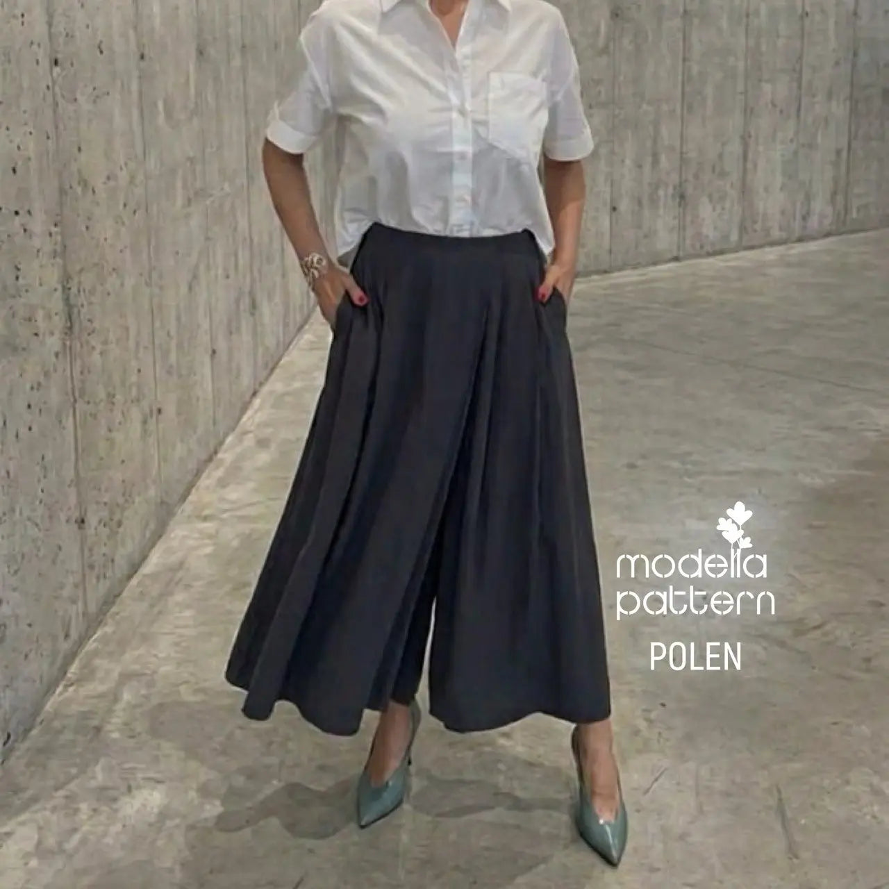 Front-pleated culottes with elastic back waistband. High-waisted summer trousers digital pattern by Modella Pattern. Grey flowy culottes style.